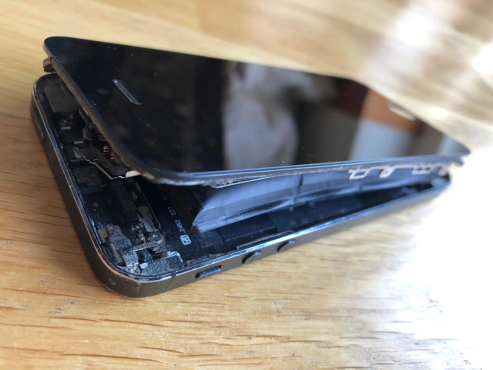 opgezwollen smartphone batterij
